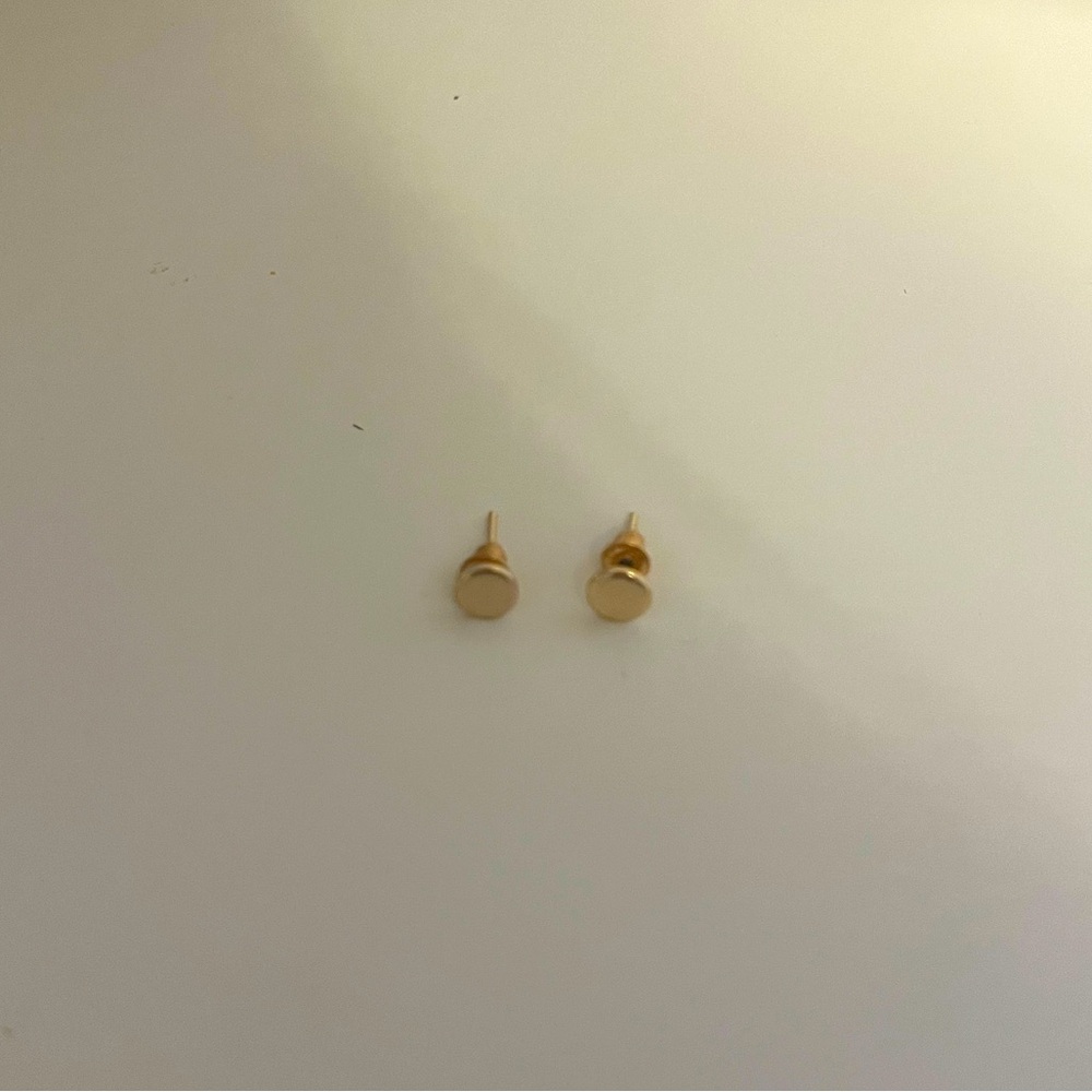 Gold circle stud earrings